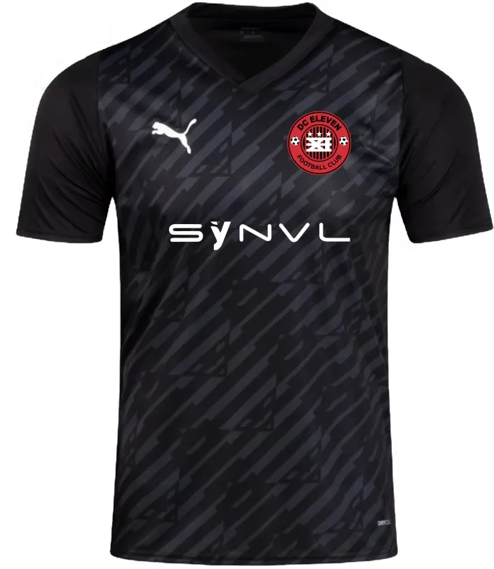 The DC Eleven home jersey: black with a faint diagonal pattern, the DC Eleven crest and the SYNVL logo.